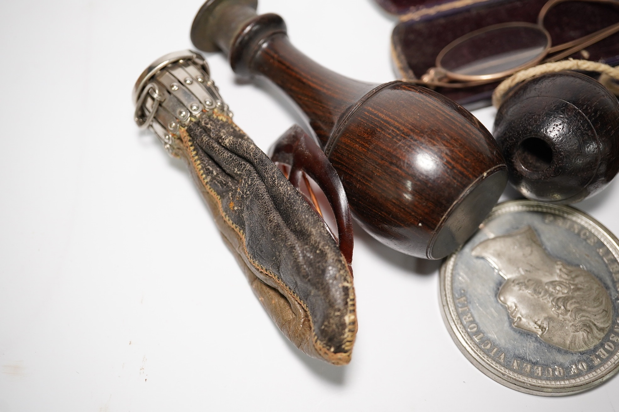 A group of various oddities to include a miser's purse, a lignum vitae ball and cup game, a mourning brooch, spectacles etc. Condition - varies